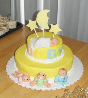picture of a yellow moon and stars baby shower cake